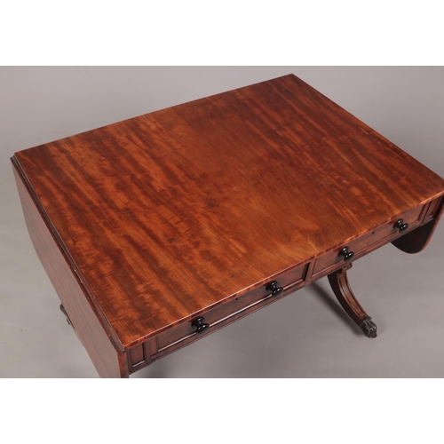 271 - A Regency mahogany sofa table. With a pair of drawers to the frieze and dummies to the back, turned ... 