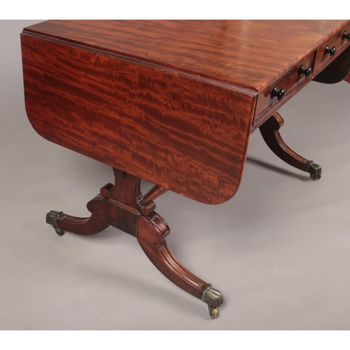 271 - A Regency mahogany sofa table. With a pair of drawers to the frieze and dummies to the back, turned ... 