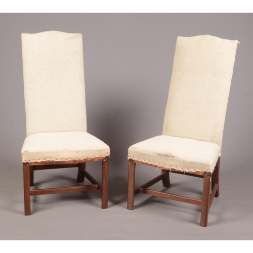 276 - A pair of George II style 19th century mahogany framed high backed hall chairs, 114cm high, seat hei... 