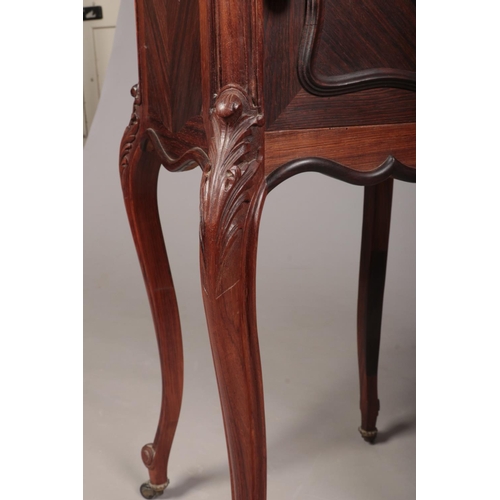 277 - A pair of early 20th century French kingwood and rosewood marble top pot cupboards. Each with a sing... 