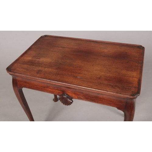 287 - A George II Irish mahogany silver table with notched rectangular dish top. With a pair of carved she... 