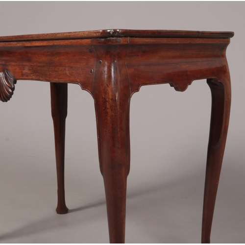 287 - A George II Irish mahogany silver table with notched rectangular dish top. With a pair of carved she... 