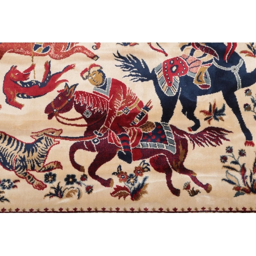 75 - Red ground Kashmir rug with a traditional hunting scene, 240 x 160cm.