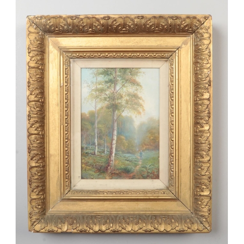 233 - Edwardian school, small gilt framed oil on board. A gentleman taking a stroll through woodland. Mono... 