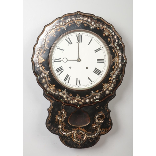 76 - A Victorian lacquered papier mache drop dial wall clock. With painted dial and embellished with abal... 