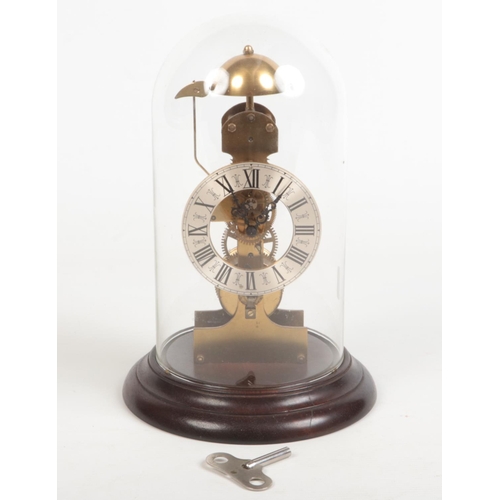 66 - A late 20th century German brass skeleton clock on mahogany plinth and under glass dome. With one tr... 