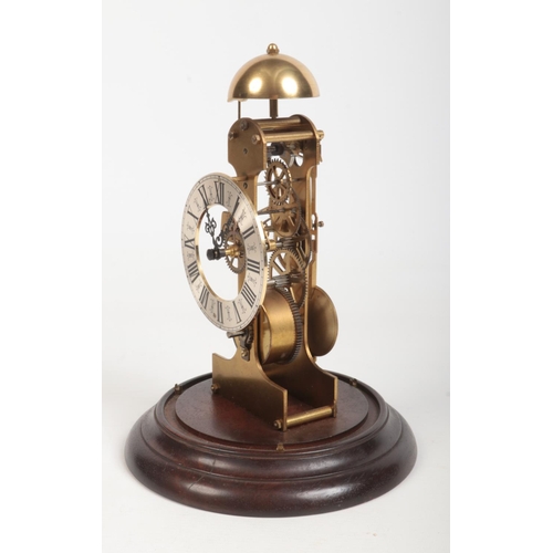 66 - A late 20th century German brass skeleton clock on mahogany plinth and under glass dome. With one tr... 