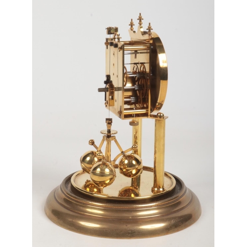 69 - An early 20th century brass torsion clock under glass dome. With white enamel dial having Arabic num... 