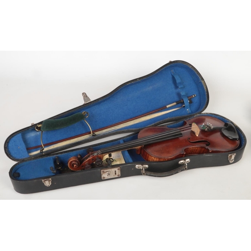 85 - A cased violin and bow. Label for John Betts, Royal Exchange. Stamped to the reverse underneath the ... 