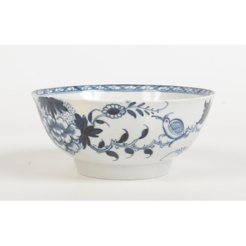 94 - A Philip Christian & Co. Liverpool blue and white bowl. Painted in underglaze blue with a bird perch... 