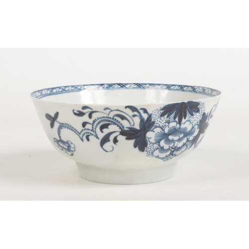 94 - A Philip Christian & Co. Liverpool blue and white bowl. Painted in underglaze blue with a bird perch... 