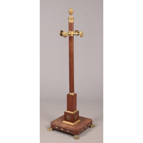 282 - A 19th century mahogany hat and coat stand.With ormolu mounts having urn finial, mask pegs and raise... 