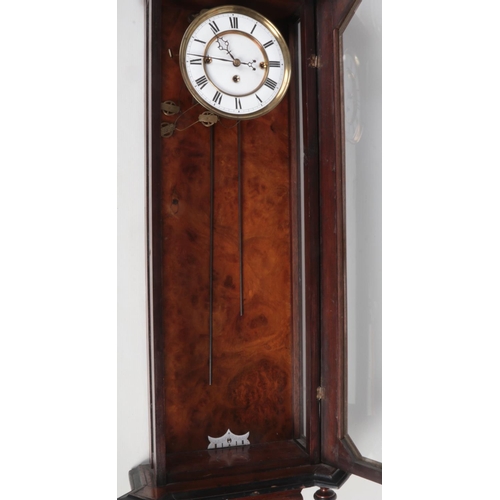 90 - A 19th century walnut cased Vienna wall clock by Gustav Becker. With ebonized mouldings and enamel d... 