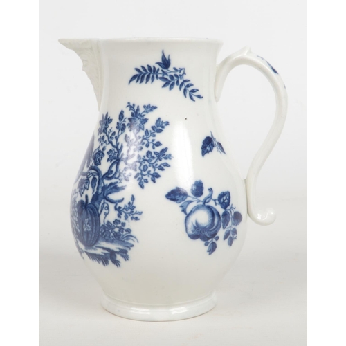 95 - A Caughley baluster shaped mask jug. Printed in underglaze blue with the Parrot Pecking Fruit patter... 