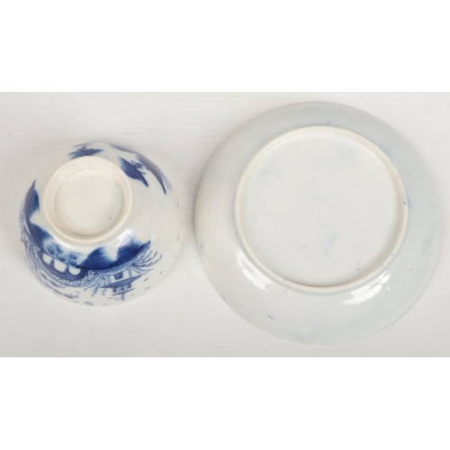 97 - a Caughley teabowl and saucer. Painted in underglaze blue with the Bridge and Windmill pattern c.178... 