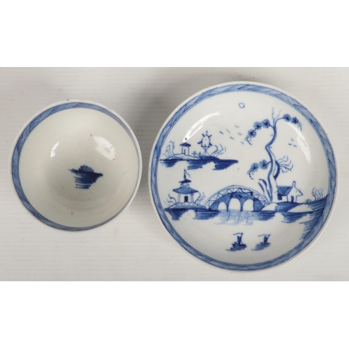 97 - a Caughley teabowl and saucer. Painted in underglaze blue with the Bridge and Windmill pattern c.178... 