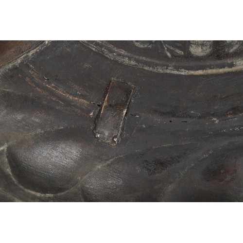 78 - A 17th century brass alms dish. Embossed with a rosette centre under a gadrooned well and with a pun... 