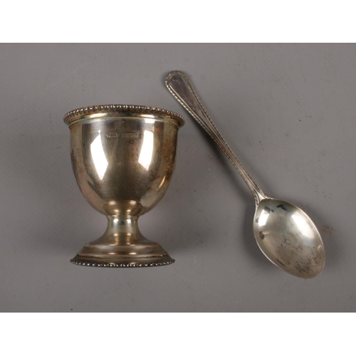 315 - A silver egg cup and spoon made by B&Co (Broadway & Co) in a presentation box, probably as a christe... 