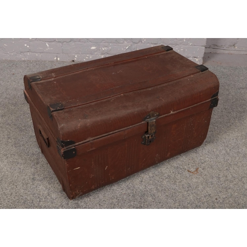 373 - A metal trunk with handles to each side, 65 x 43 x 37 cm.