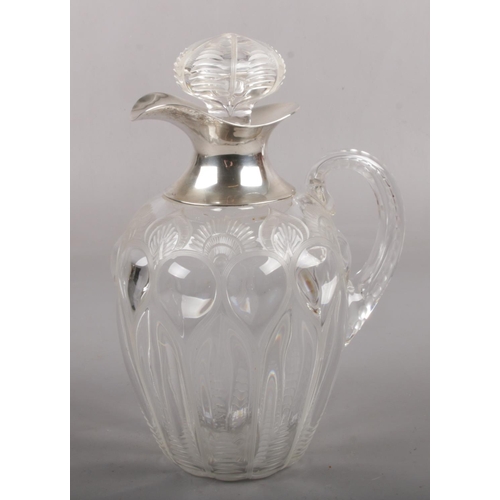 308 - An Edwardian silver mounted cut and blown glass whiskey jug, assayed London 1901 by William Comyns &... 