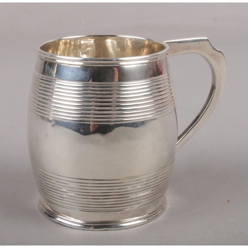 309 - A George III silver Christening mug of barrel form, assayed London 1802 by Peter, Ann & William Bate... 