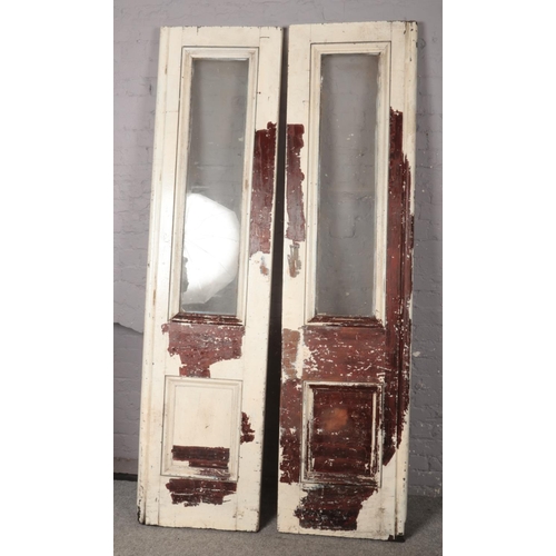 360 - A pair of large painted mahogany doors with panelled glass, possibly from a chateau. (241cm x 60cm)