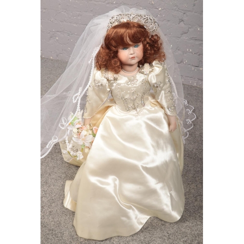 381 - A fine porcelain collectors' doll from the Lilian Middleton Doll Company (Sheep Street, Stow--on-the... 