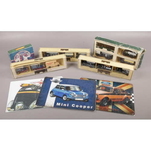 110 - A collection of boxed Lledo Days Gone diecast model vehicles, along with three modern metal automobi... 