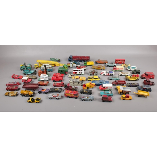 113 - A box of die cast vehicles, Dinky, Corgi, Matchbox examples.