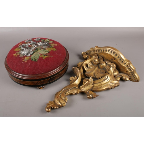 108 - A Victorian footstool with beadwork upholstery, along with a gilt wood corbel.