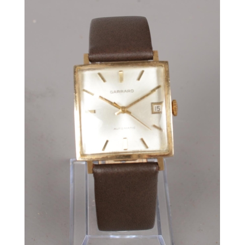 293 - A gentleman's 9ct gold cased Garrard automatic wristwatch.