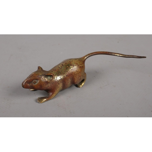 325 - A small bronze model of mouse. (3cm x 10cm)