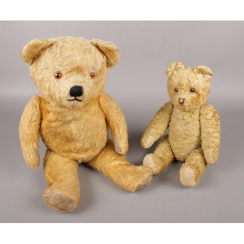 71 - Two vintage jointed mohair bears, both with glass inset eyes.