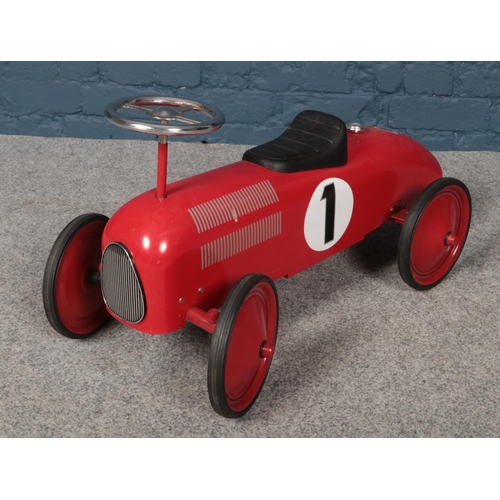 394 - A child's vintage style Schylling Rowley metal ride on motor car. (Body 72cm, height 40cm, width 34c... 