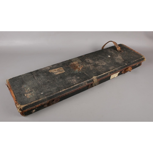 399 - A vintage leather bound gun case, with label for James Dalziel Dougall, gun and rifle manufacturer. ... 