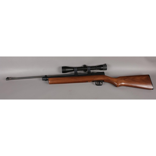 401 - A Crosman 2260 bolt action .22 calibre air rifle with attached 6x40 scope. (803B10558)

CAN NOT POST