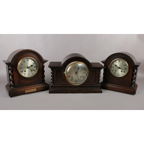 83 - Three wooden mantel clocks comprising of two 'Astral 'oak mantel clocks, one of which was presented ... 