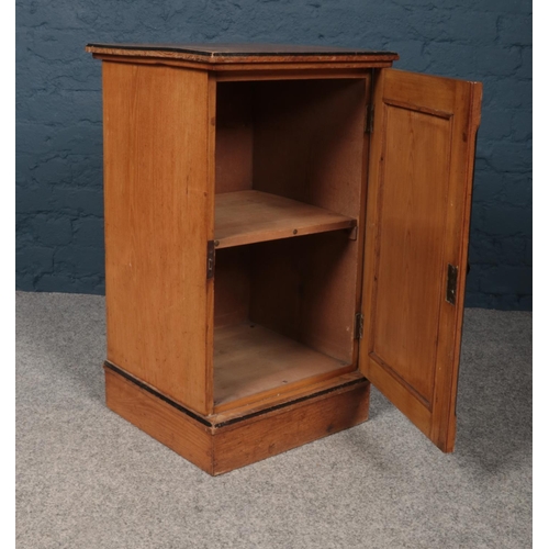 421 - A Victorian side cabinet with painted ebonised decoration on the top and door. Inside a single shelf... 