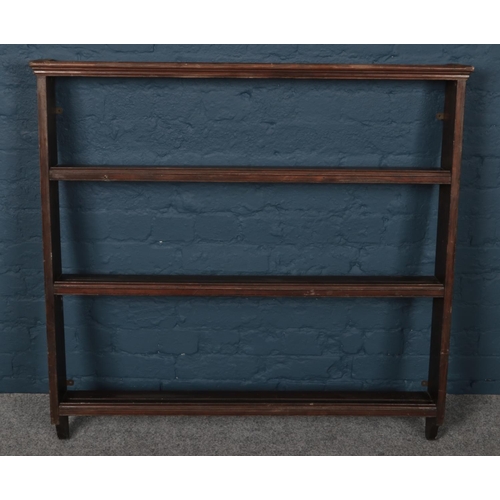 424 - A mahogany delft rack. (103cm x 105cm)