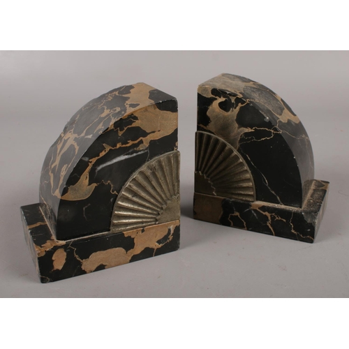 88 - A pair of Art Deco marble bookends.