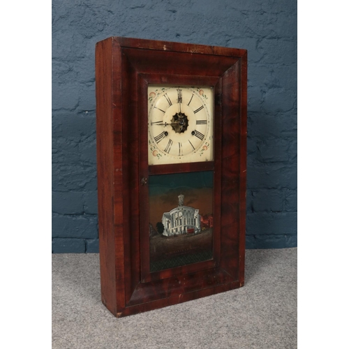 93 - A wall mounted wooden boxed clock with ornate glass front depicting the Merchants' Exchange in Phila... 