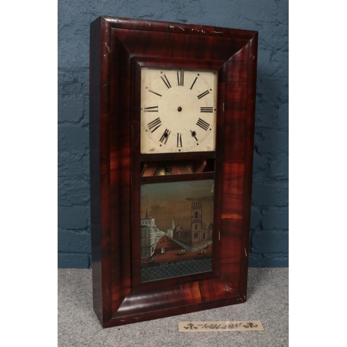 94 - A Chauncey Jerome (American) wooden mounted wall clock with glass fronted door. There is a scene of ... 