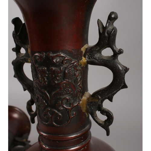 125 - A pair of decorative Chinese bronze vases (height 30cm).