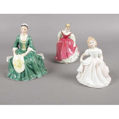 353 - Three Royal Doulton ceramic figurines, 'A Lady from Williamsburg' HN 2228, 'Amanda' HN 2996, 'Fair M... 