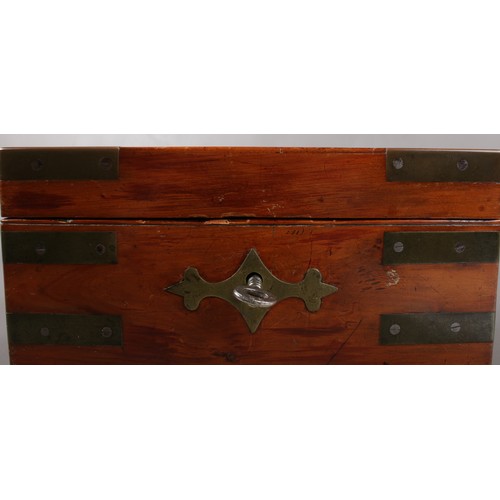 69 - A 19th century yew wood campaign box with brass mounts, working locks and key.