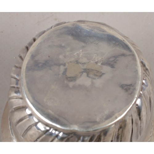 331 - A George II silver caudle cup, assayed London 1743. 61g.