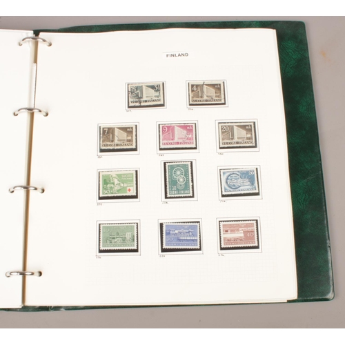 111 - Three Albums of Stamps & First Day Covers. Two Albums containing a collection of Worldwide mint and ... 