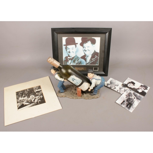 114 - A quantity of Laurel & Hardy memorabilia. Including framed limited edition pieces of film with COA, ... 