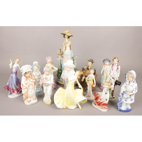 67 - A quantity of ceramic figurines.