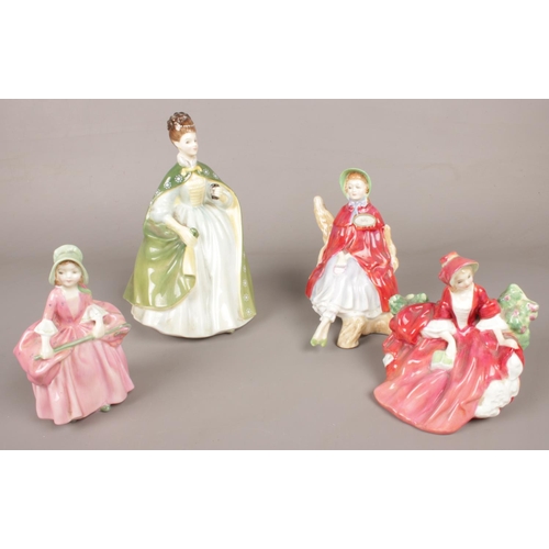 71 - Four Royal Doulton ceramic lady figurines.